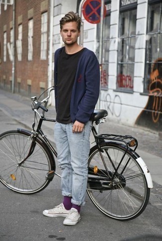 Violet Socks Casual Outfits For Men: A navy cardigan and violet socks are a savvy combo to have in your day-to-day casual fashion mix. And if you need to easily smarten up your look with footwear, add a pair of white canvas low top sneakers to the equation.