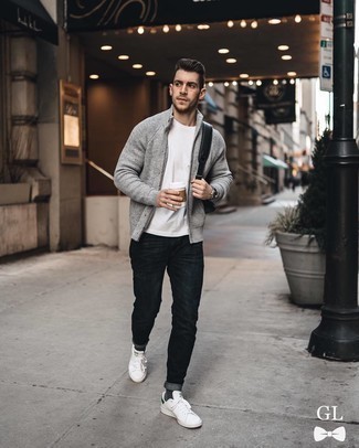 Grey Cardigan Outfits For Men: Teaming a grey cardigan with navy jeans is an on-point pick for a neat and relaxed getup. Let your outfit coordination credentials really shine by finishing your outfit with a pair of white and green leather low top sneakers.