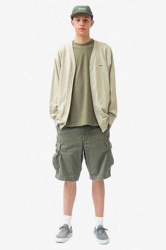 Grey Suede Low Top Sneakers Outfits For Men: This look with a mint cardigan and olive shorts isn't a hard one to pull off and is easy to adapt. Grey suede low top sneakers are an effective way to inject an air of stylish effortlessness into your ensemble.