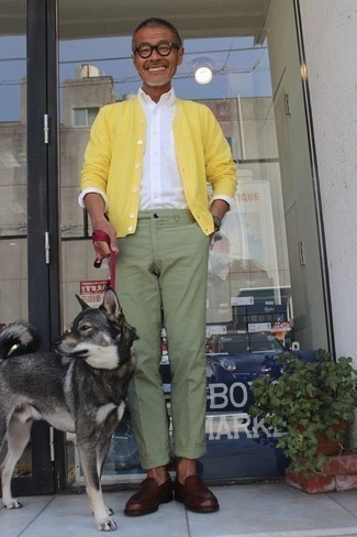 Olive Watch Outfits For Men: You're looking at the indisputable proof that a yellow cardigan and an olive watch look awesome when matched together in a modern casual ensemble. Inject your ensemble with a touch of refinement by finishing off with burgundy leather loafers.