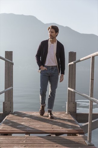 Beige Long Sleeve Shirt Outfits For Men: Fashionable and comfortable, this relaxed pairing of a beige long sleeve shirt and charcoal jeans provides with variety. Wondering how to complete this look? Finish off with dark brown leather derby shoes to bump it up a notch.