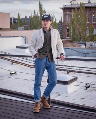 Beige Cardigan Outfits For Men: Dress in a beige cardigan and blue jeans for a laid-back and stylish look. Brown suede casual boots will take your getup in a dressier direction.