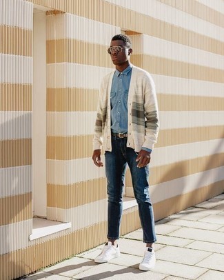 Beige Horizontal Striped Cardigan Outfits For Men: Show off your chops in men's fashion by combining a beige horizontal striped cardigan and navy jeans for an off-duty ensemble. If not sure as to what to wear when it comes to footwear, go with a pair of white canvas low top sneakers.