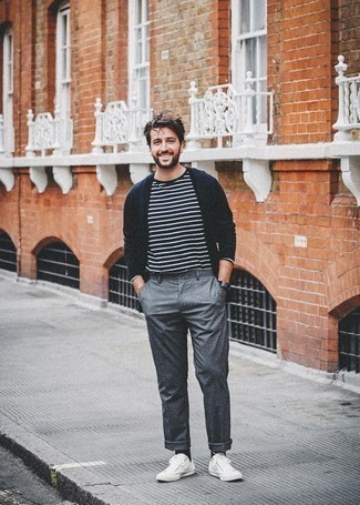 Navy Long Sleeve T-Shirt Outfits For Men: Marry a navy long sleeve t-shirt with grey chinos for a laid-back kind of class. We're totally digging how this whole outfit comes together thanks to a pair of white canvas low top sneakers.