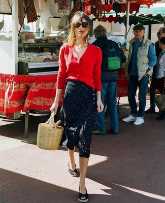Red Cardigan Outfits For Women: If you appreciate functional style, wear a red cardigan and a black print silk midi skirt. Switch up this look by finishing off with black canvas wedge sandals.