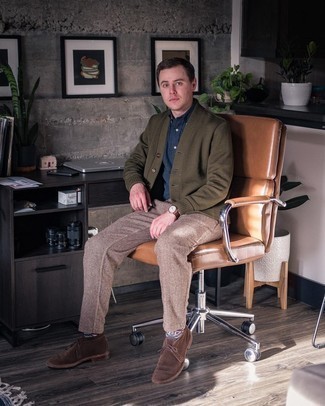 Polo Outfits For Men: A polo and khaki herringbone wool chinos are stylish menswear pieces, without which our closets would surely be incomplete. Finishing off with dark brown suede desert boots is the simplest way to infuse an added dose of elegance into your look.