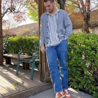 Grey Cardigan Outfits For Men: If you gravitate towards casual combos, why not pair a grey cardigan with blue jeans? Orange leather high top sneakers are an effortless way to punch up this getup.