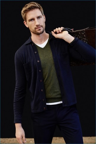 Dark Green V-neck Sweater Outfits For Men: Reach for a dark green v-neck sweater and navy chinos for a daily outfit that's full of charm and personality.