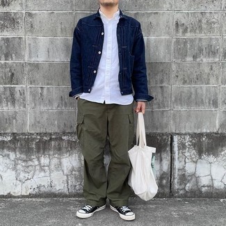 Men's Black and White Canvas Low Top Sneakers, Olive Cargo Pants, White Long Sleeve Shirt, Navy Denim Jacket