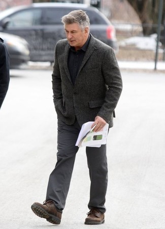Alec Baldwin wearing Charcoal Wool Blazer, Black Long Sleeve Shirt, Charcoal Chinos, Brown Leather Derby Shoes