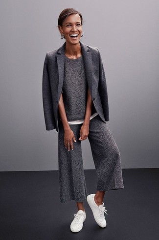 Charcoal Wool Culottes Outfits: This relaxed casual combination of a charcoal wool blazer and charcoal wool culottes is extremely easy to throw together without a second thought, helping you look awesome and prepared for anything without spending a ton of time combing through your closet. Why not complement your ensemble with a pair of white low top sneakers for a hint of casualness?