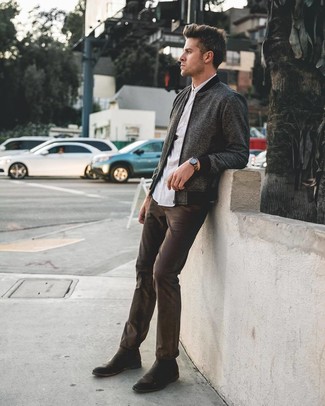 Dark Brown Jeans Outfits For Men: A charcoal wool bomber jacket and dark brown jeans are bona fide menswear must-haves if you're figuring out a casual wardrobe that matches up to the highest sartorial standards. A trendy pair of black leather chelsea boots is the most effective way to power up this ensemble.