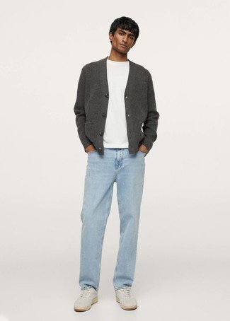 Charcoal Cardigan Outfits For Men: A charcoal cardigan and light blue jeans? This is an easy-to-achieve ensemble that any guy can wear a variation of on a day-to-day basis. Feeling creative? Shake up your outfit with a pair of white canvas low top sneakers.