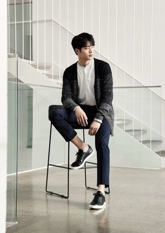 Charcoal Cardigan Outfits For Men: This combination of a charcoal cardigan and navy chinos is a safe bet for a seriously cool ensemble. You can get a little creative in the footwear department and dress down your ensemble by rocking a pair of black leather low top sneakers.