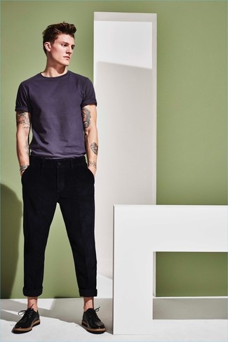 Black Chinos Hot Weather Outfits: This combination of a charcoal crew-neck t-shirt and black chinos is proof that a safe off-duty outfit doesn't have to be boring. Lift up this ensemble with the help of black leather derby shoes.