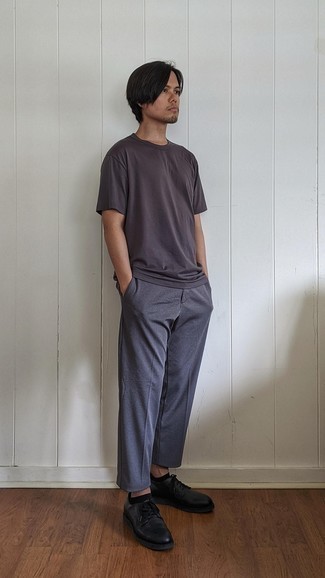 Charcoal Chinos Outfits: A charcoal crew-neck t-shirt and charcoal chinos are great menswear must-haves that will integrate really well within your daily rotation. Perk up your ensemble by finishing off with a pair of black leather derby shoes.