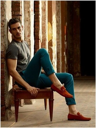 Tobacco Suede Loafers Outfits For Men: A charcoal crew-neck t-shirt and teal chinos are both versatile menswear must-haves that will integrate perfectly within your current outfit choices. Add tobacco suede loafers to this look to make the outfit a bit sleeker.
