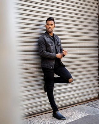 Charcoal Denim Jacket Outfits For Men: This contemporary combination of a charcoal denim jacket and black ripped skinny jeans is super easy to throw together in no time flat, helping you look dapper and prepared for anything without spending a ton of time searching through your wardrobe. Complete your getup with a pair of black leather chelsea boots for an on-trend hi-low mix.