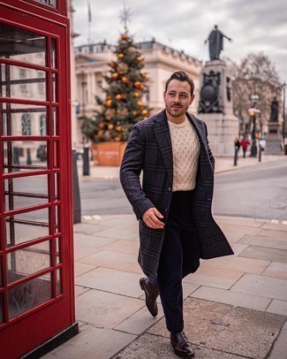 Tan Cable Sweater Outfits For Men: A tan cable sweater and navy corduroy chinos are both versatile menswear essentials that will integrate perfectly within your daily off-duty routine. Give an elegant twist to your getup by rocking dark brown leather chelsea boots.