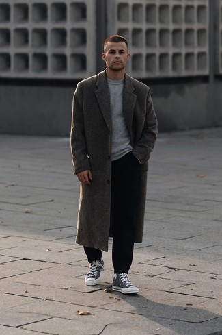 Charcoal Overcoat Outfits: A charcoal overcoat and black chinos are the kind of a never-failing getup that you need when you have no time to plan an ensemble. Charcoal canvas high top sneakers are the most effective way to upgrade this outfit.
