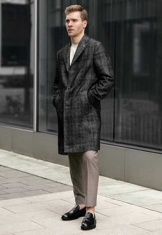 Charcoal Plaid Overcoat Outfits: For an ensemble that's worthy of a modern fashion-savvy guy and effortlessly classic, team a charcoal plaid overcoat with khaki chinos. Introduce a pair of black leather loafers to the mix to completely switch up the ensemble.