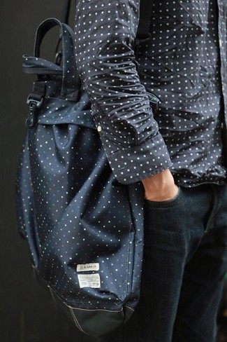 Navy Polka Dot Leather Tote Bag Outfits For Men: This modern casual combo of a charcoal polka dot long sleeve shirt and a navy polka dot leather tote bag is capable of taking on different nuances depending on the way it's styled.