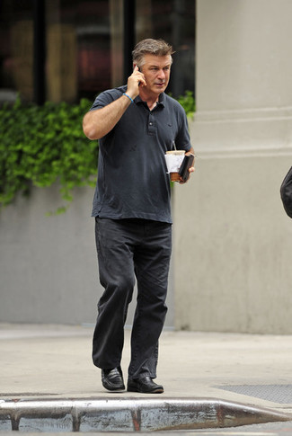 Alec Baldwin wearing Charcoal Polo, Black Jeans, Black Leather Loafers