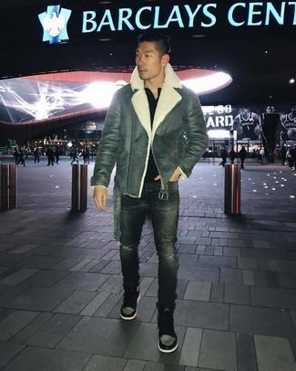 Charcoal Shearling Jacket Outfits For Men: Reach for a charcoal shearling jacket and charcoal ripped jeans for a trendy and bold casual ensemble. As for footwear, complement this outfit with a pair of black leather high top sneakers.