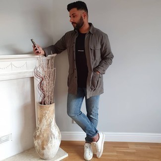 Charcoal Shirt Jacket Outfits For Men: Such staples as a charcoal shirt jacket and blue jeans are the ideal way to introduce effortless cool into your off-duty styling rotation. Unimpressed with this look? Let white leather low top sneakers shake things up.