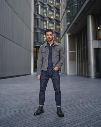 Grey Shirt Jacket Outfits For Men: Teaming a grey shirt jacket with navy skinny jeans is a good choice for a laid-back and cool ensemble. You could perhaps get a little creative when it comes to shoes and complete your outfit with black leather casual boots.