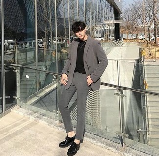 Charcoal Suit Outfits: Go for a pared down but stylish option by putting together a charcoal suit and a black crew-neck t-shirt. Black chunky leather derby shoes will smarten up this look.