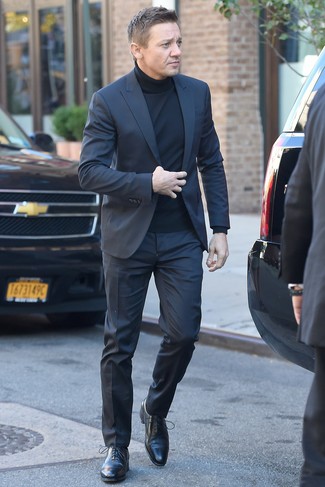 Jeremy Renner wearing Charcoal Suit, Black Turtleneck, Black Leather Oxford Shoes