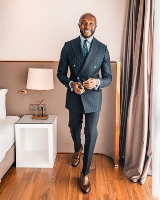 Brown Leather Loafers Outfits For Men: For a look that's dapper and camera-worthy, dress in a charcoal vertical striped suit and a light blue dress shirt. If you're wondering how to finish off, introduce a pair of brown leather loafers to the equation.
