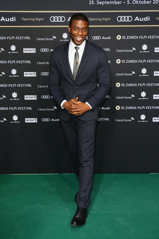 Chadwick Boseman wearing Charcoal Wool Suit, White Dress Shirt, Black Leather Derby Shoes, Grey Tie