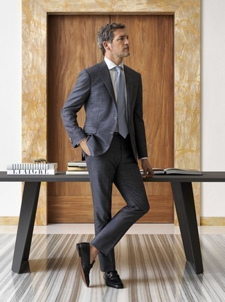 Charcoal Suit Outfits: This is indisputable proof that a charcoal suit and a white dress shirt look amazing together in an elegant getup for today's gentleman. Bring a different twist to this outfit by rocking black leather loafers.