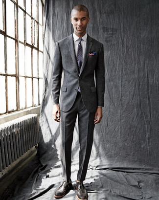Purple Polka Dot Tie Outfits For Men: A charcoal wool suit and a purple polka dot tie are among the basic elements of a polished menswear collection. Why not take a more laid-back approach with footwear and add a pair of dark brown leather brogues to the equation?