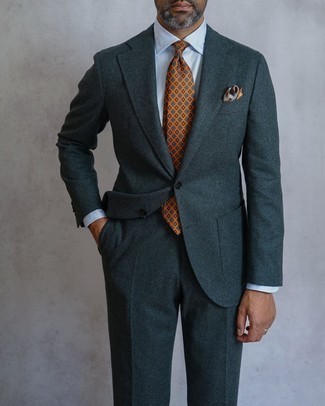 Mustard Tie Outfits For Men: A charcoal wool suit and a mustard tie are a sophisticated outfit that every smart gentleman should have in his closet.