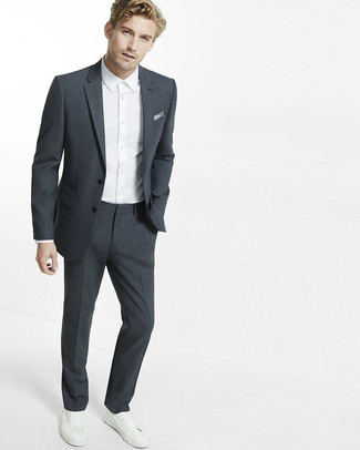 Olive Pocket Square Outfits: This laid-back combination of a charcoal suit and an olive pocket square is very easy to pull together without a second thought, helping you look awesome and ready for anything without spending a ton of time searching through your closet. This look is completed really well with a pair of white leather low top sneakers.