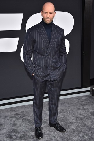 Jason Statham wearing Charcoal Vertical Striped Suit, Navy Turtleneck, Black Leather Oxford Shoes