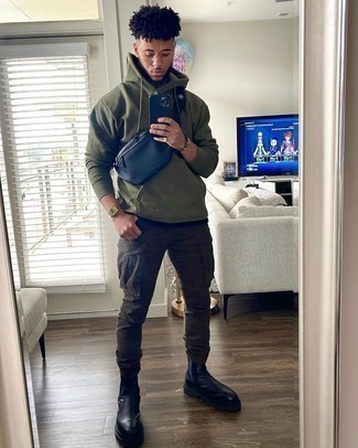 Men's Navy Canvas Fanny Pack, Black Leather Chelsea Boots, Dark Brown Cargo Pants, Olive Hoodie