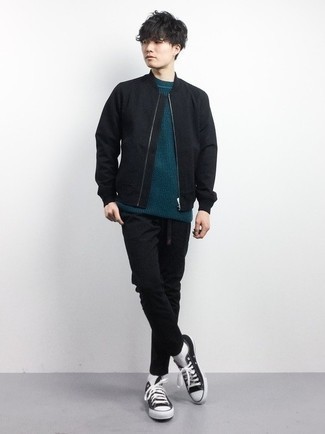 Men's Black and White Canvas Low Top Sneakers, Black Chinos, Teal Crew-neck Sweater, Black Bomber Jacket