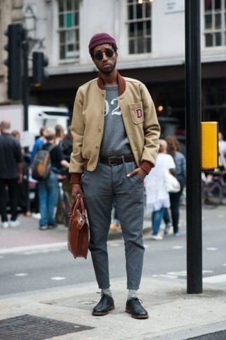 Men's Black Leather Oxford Shoes, Grey Chinos, Grey Print Crew-neck Sweater, Tan Varsity Jacket
