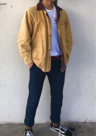 Men's Black Canvas Low Top Sneakers, Navy Chinos, White Crew-neck T-shirt, Mustard Barn Jacket
