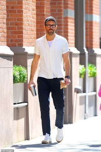 White Crew-neck T-shirt with Low Top Sneakers Outfits For Men After 40: 