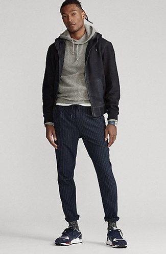 Men's Navy and White Athletic Shoes, Black Vertical Striped Chinos, Grey Knit Hoodie, Black Bomber Jacket