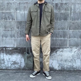 Men's Black and White Canvas Low Top Sneakers, Beige Chinos, Navy Hoodie, Olive Shirt Jacket