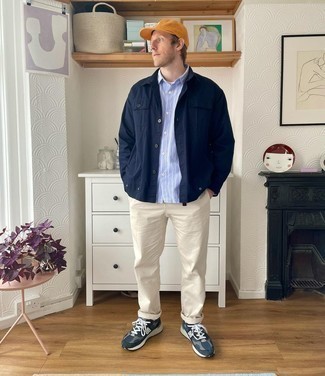 Men's Navy and White Athletic Shoes, Beige Chinos, Light Blue Vertical Striped Long Sleeve Shirt, Navy Shirt Jacket