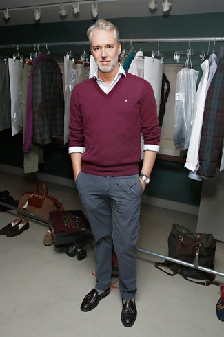 Michael Bastian wearing Dark Brown Leather Tassel Loafers, Grey Chinos, White Long Sleeve Shirt, Burgundy V-neck Sweater