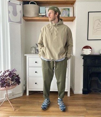 Men's Navy and White Athletic Shoes, Olive Chinos, Light Blue Vertical Striped Long Sleeve Shirt, Tan Windbreaker