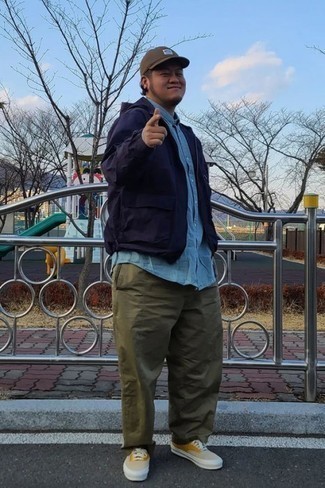 Men's Multi colored Canvas Low Top Sneakers, Olive Chinos, Light Blue Short Sleeve Shirt, Navy Windbreaker